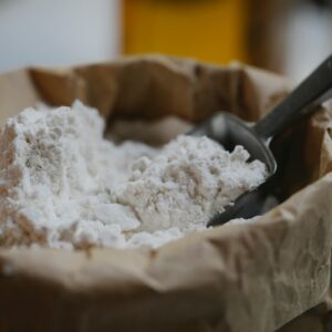 Photo by Klaus Nielsen: https://www.pexels.com/photo/paper-bag-of-wheat-flour-with-stainless-scoop-6287223/